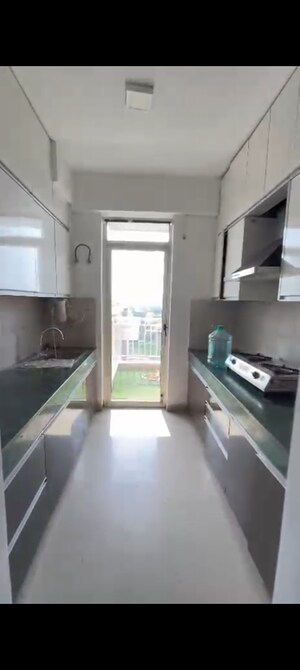 Kitchen in 2.5 BHK Apartment at Puri Pratham, Sector 84 – for Rent