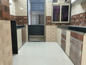Kitchen in 3 BHK Apartment at Jangid Galaxy, Ghodbunder Road – for Rent