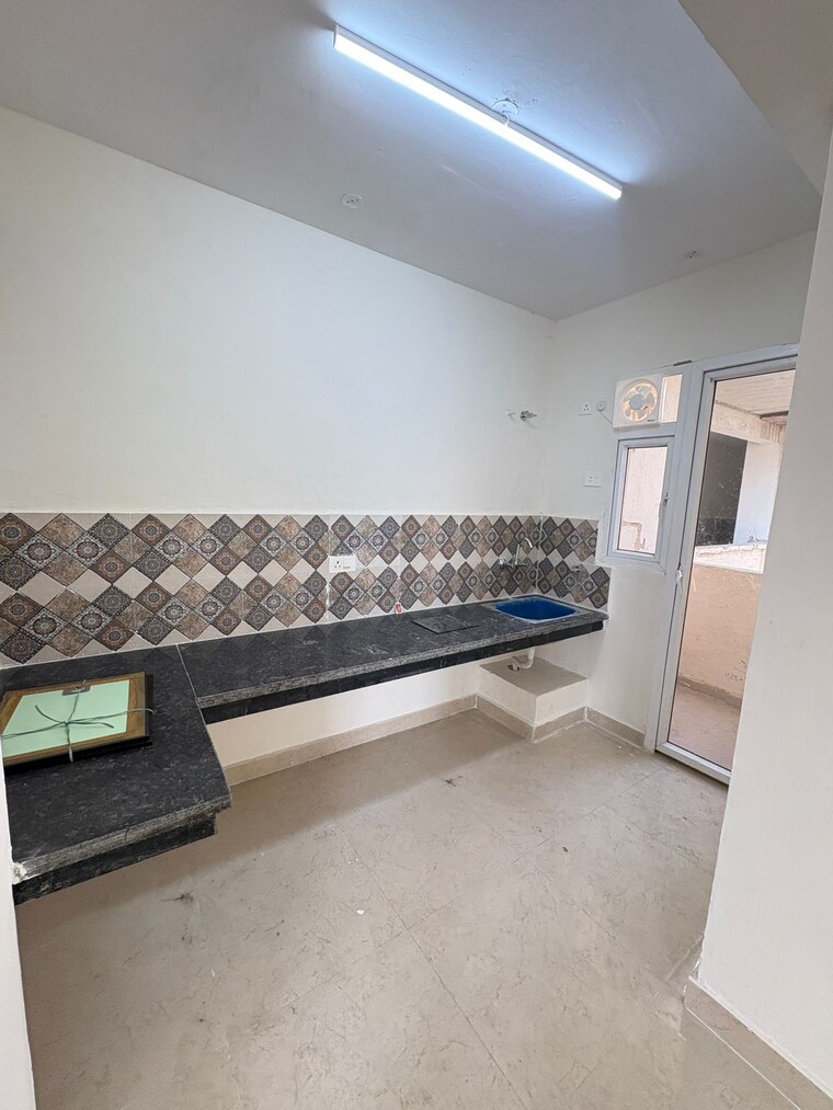 Kitchen, signature-the-millennia-3 2 Bedroom 596 Sq.Ft. Apartment In Sector 37d Gurgaon 9535671