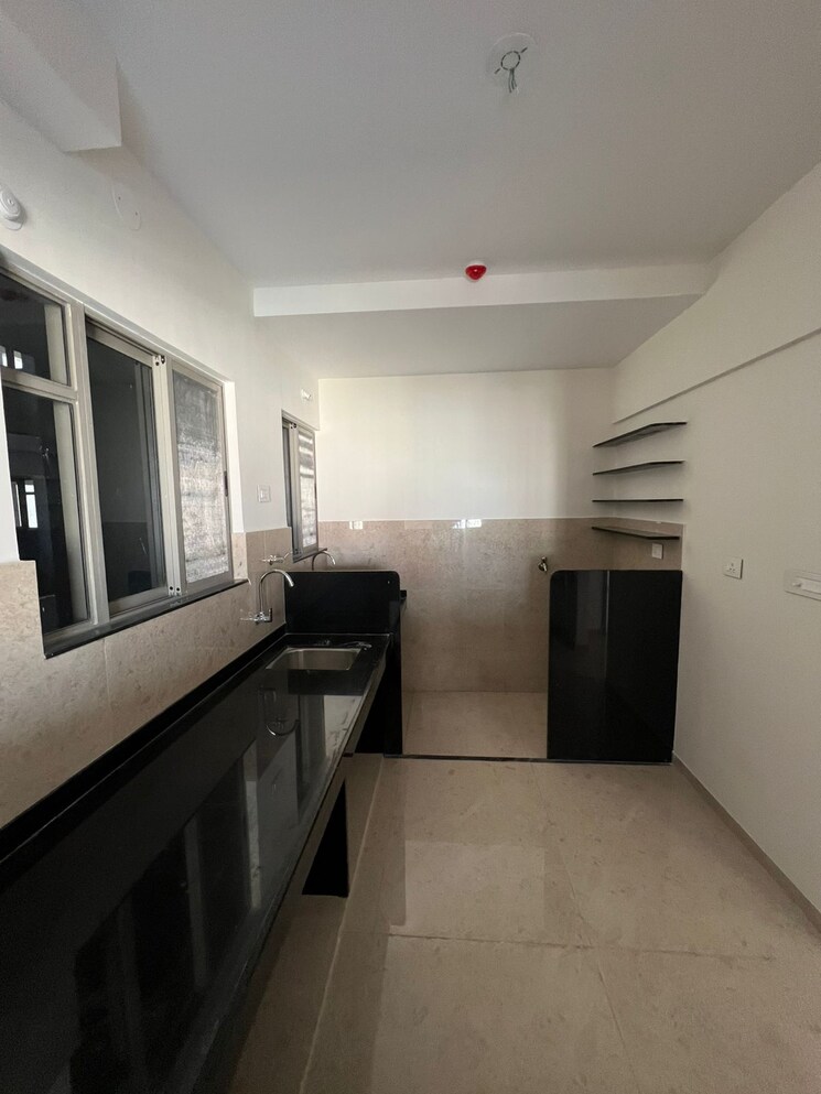 Kitchen, vj-yashwin-nuovo-centro 3 Bedroom 974 Sq.Ft. Apartment In Wakad Pune 9535702