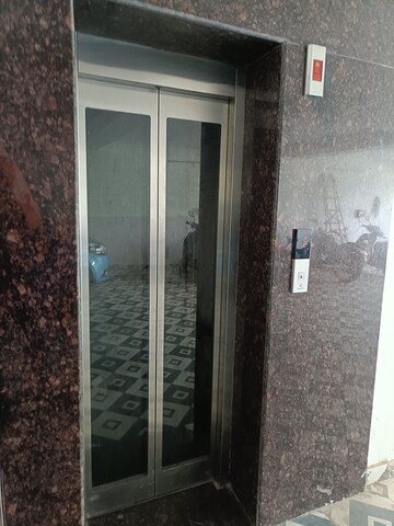 Building Lobby in 2 BHK Apartment at Ansal API Esencia, Sector 67 – for Rent