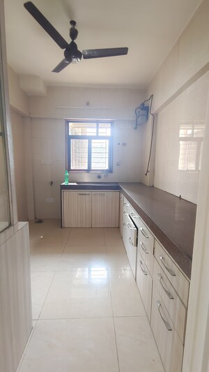 Kitchen in 2 BHK Apartment at Jasmine Tower, Vasant Vihar – for Rent