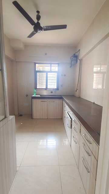 Kitchen in 2 BHK Apartment at Jasmine Tower, Vasant Vihar – for Rent