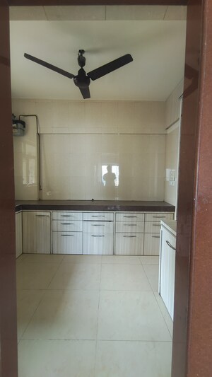 Kitchen in 2 BHK Apartment at Jasmine Tower, Vasant Vihar – for Rent
