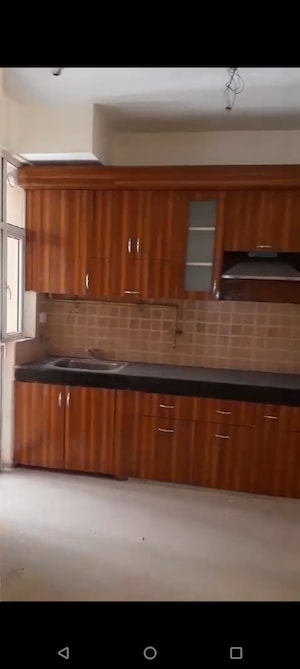 Kitchen in 4 BHK Apartment at Mahagun Mywoods, Sector 16c Greater Noida – for Rent