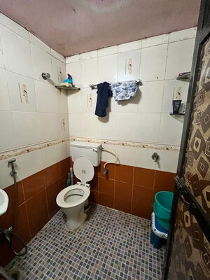 Bathroom in 1 BHK Apartment at Gokuldham Complex, Goregaon East – for Rent