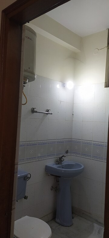 Bathroom in 2 BHK Builder Floor at Khirki Extension – for Rent