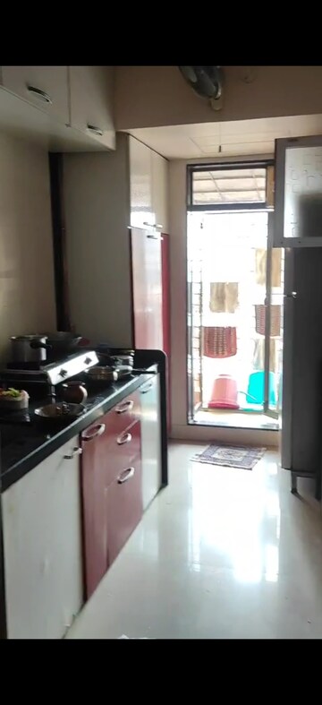 Kitchen in 2 BHK Apartment at Jalaram Vihar, Borivali West – for Sale