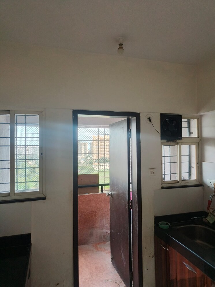 Kitchen, mantra-senses 2 Bedroom 919 Sq.Ft. Apartment In Handewadi Pune 9536320