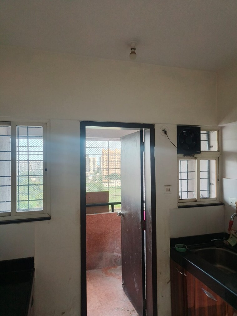 Kitchen, mantra-senses 2 Bedroom 919 Sq.Ft. Apartment In Handewadi Pune 9536320