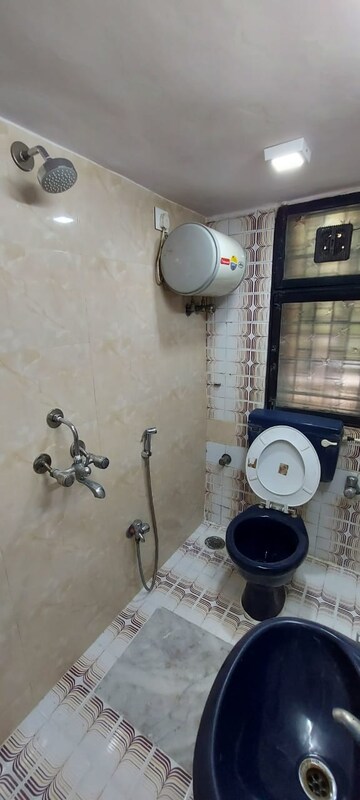 Bathroom in 3 BHK Apartment at Sunny Side Apartment, Andheri West – for Rent