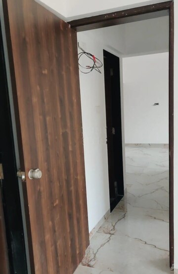 Building Lobby in 2 BHK Apartment at Roshan Milestone, Tathawade – for Rent