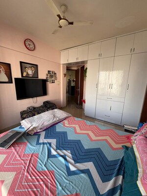 Bedroom in 2 BHK Apartment at Madhupushpa Ph-1 CHS, Wakad – for Sale