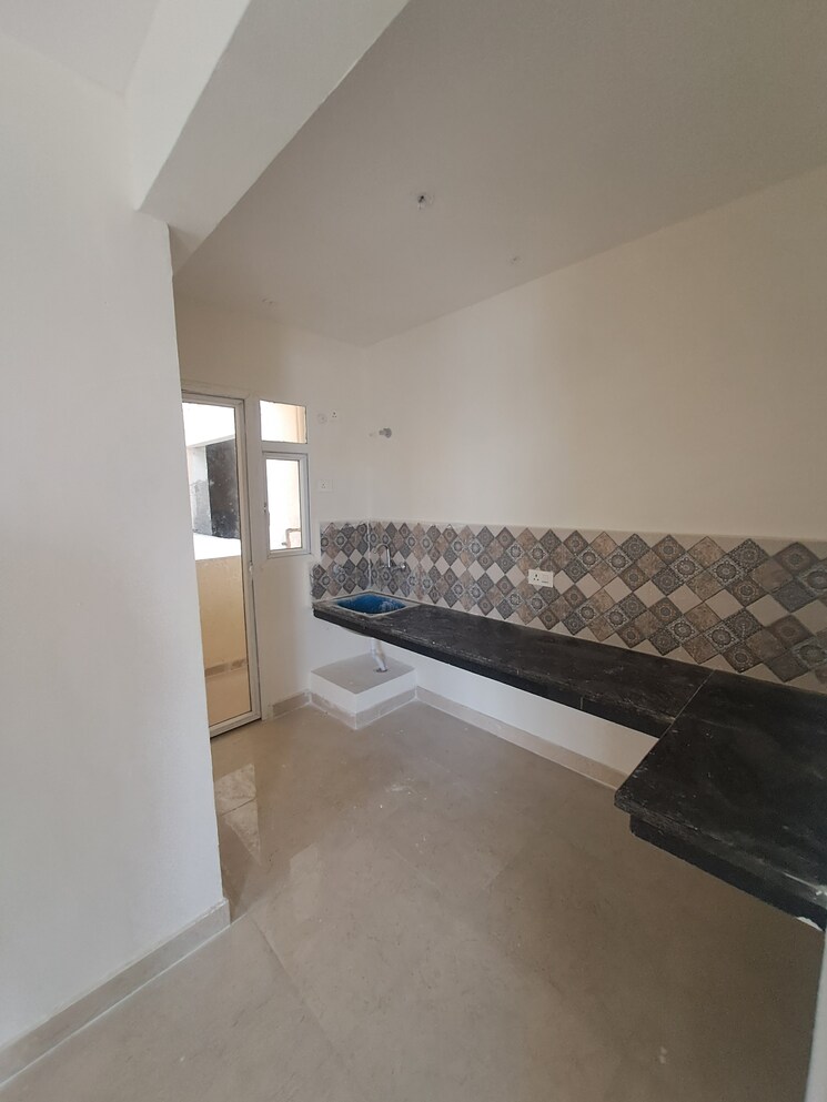 Kitchen, signature-the-millennia-3 2 Bedroom 1000 Sq.Ft. Apartment In Sector 37d Gurgaon 9537255