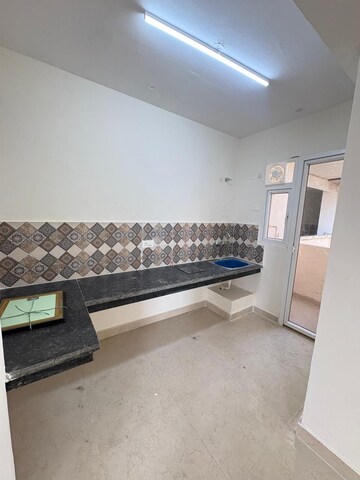 Kitchen in 2 BHK Apartment at Signature The Millennia 3, Sector 37d – for Rent