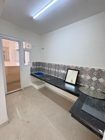 Kitchen in 2 BHK Apartment at Signature The Millennia 3, Sector 37d – for Rent