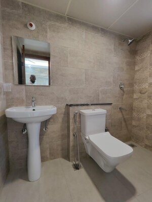 Bathroom in 3 BHK Apartment at Mantri Webcity, Hennur – for Rent