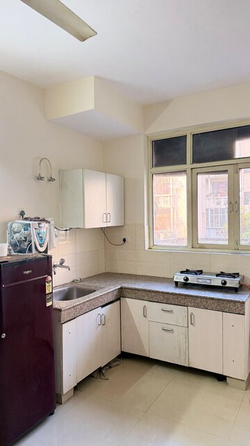 Kitchen in 1 BHK Apartment at NK Sharma Savitry Greens, Lohgarh – for Rent