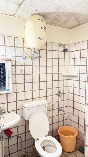 Bathroom in 1 BHK Apartment at NK Sharma Savitry Greens, Lohgarh – for Rent