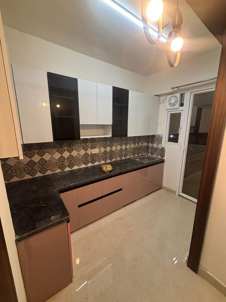 Kitchen, signature-the-millennia-3 2 Bedroom 661 Sq.Ft. Apartment In Sector 37d Gurgaon 9537555