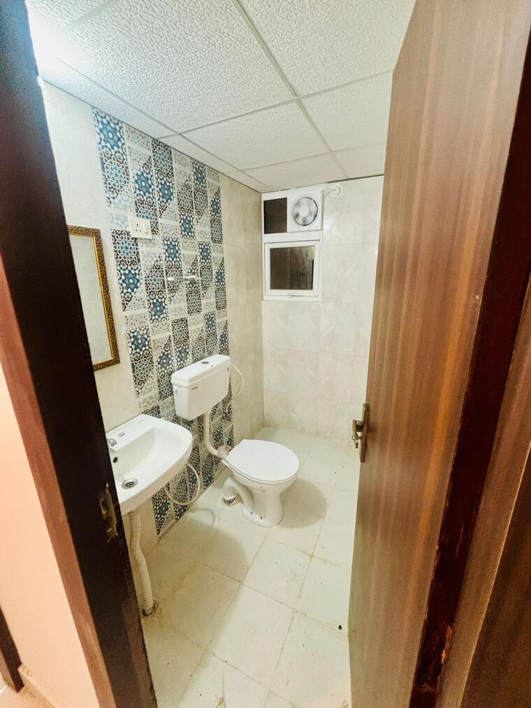 Kitchen, signature-the-millennia-3 2 Bedroom 661 Sq.Ft. Apartment In Sector 37d Gurgaon 9537555