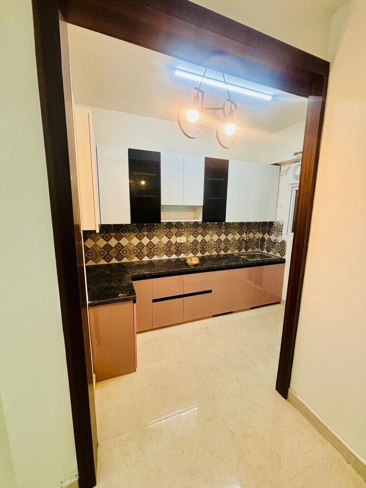 Kitchen, signature-the-millennia-3 2 Bedroom 661 Sq.Ft. Apartment In Sector 37d Gurgaon 9537555