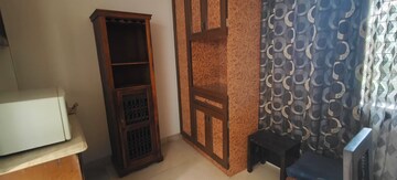 Living Room in 2 BHK Apartment at Lokhandwala Harmony, Worli – for Rent