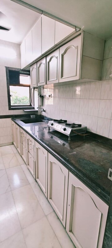 Kitchen in 1 BHK Apartment at Bina Apartment Amboli, Amboli – for Rent