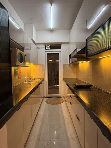 Kitchen in 2.5 BHK Apartment at Smart World Gems, Sector 89 – for Sale