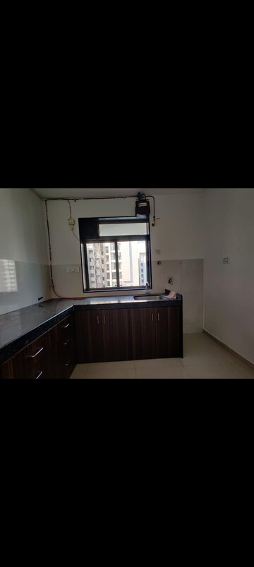 Kitchen in 2 BHK Apartment at Runwal Eirene, Balkum Pada – for Rent