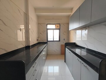 Kitchen in 2 BHK Apartment at Saaga Shri Sai Vishram CHS Ltd, Dahisar West – for Rent