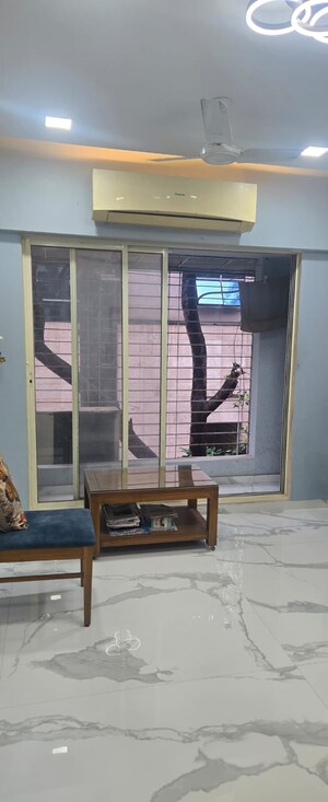 Living Room in 1 BHK Apartment at Swami Samarth Apartments, Prabhadevi – for Sale