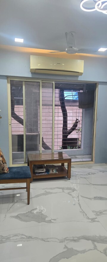 Living Room in 1 BHK Apartment at Swami Samarth Apartments, Prabhadevi – for Sale