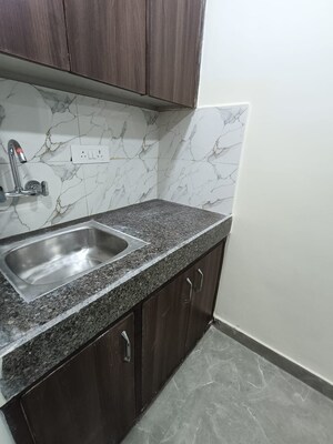 Kitchen in 1.5 BHK Builder Floor at Ansal Sushant Lok I, Sector 43 – for Rent