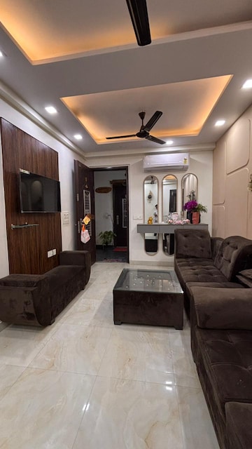 Living Room in 4 BHK Apartment at Niti Khand – for Sale