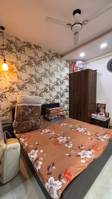 Living Room in 4 BHK Apartment at Niti Khand – for Sale