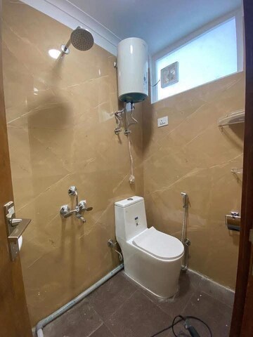 Bathroom in 3 BHK Builder Floor at Chattarpur – for Rent