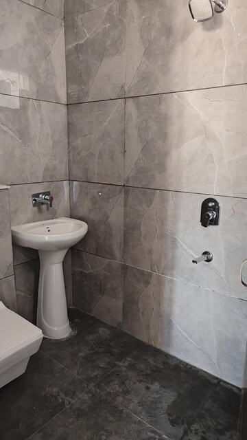 Bathroom in 3 BHK Apartment at Aura Homes, Patiala Road – for Rent