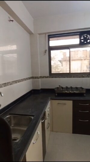 Kitchen in 1 BHK Apartment at Ganoomal Mansion CHS, Wadala West – for Rent