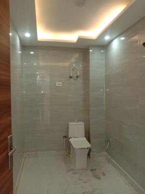 Bathroom in 4 BHK Builder Floor at Dwarka Mor – for Sale