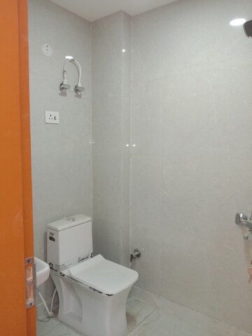 Bathroom in 4 BHK Builder Floor at Dwarka Mor – for Sale