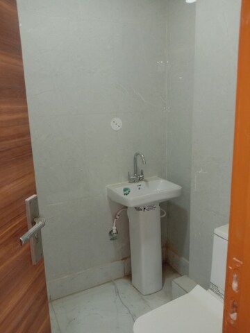 Bathroom in 4 BHK Builder Floor at Dwarka Mor – for Sale