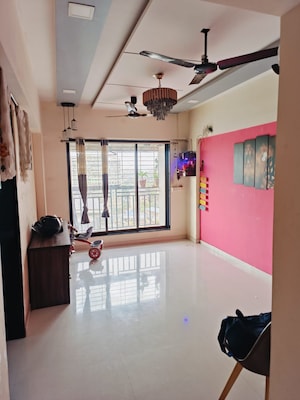 Living Room in 1 BHK Apartment at Sai Crystal Empire, Nalasopara East – for Rent
