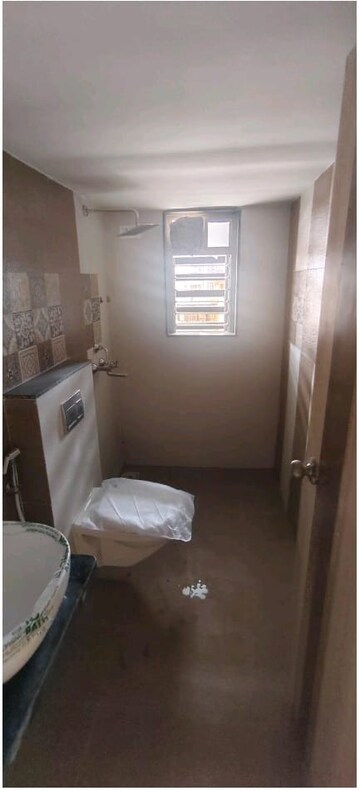 Bathroom in 3 BHK Apartment at Jangid Galaxy, Ghodbunder Road – for Rent