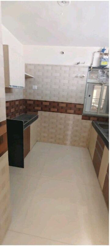 Kitchen in 3 BHK Apartment at Jangid Galaxy, Ghodbunder Road – for Rent