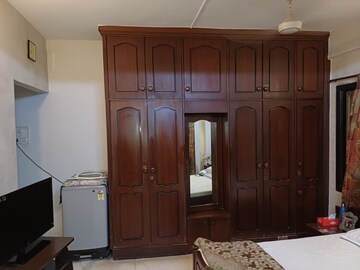 Living Room in 1.5 BHK Apartment at New Rajendra Apartment CHS, Mahim – for Sale