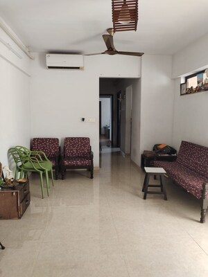 Living Room in 2 BHK Apartment at Lodha Palava City Lakeshore Greens, Dombivli East – for Sale