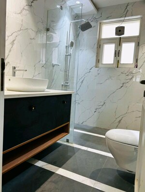 Bathroom in 4 BHK Builder Floor at Zion Onyxe Tower, Sector 21c – for Rent