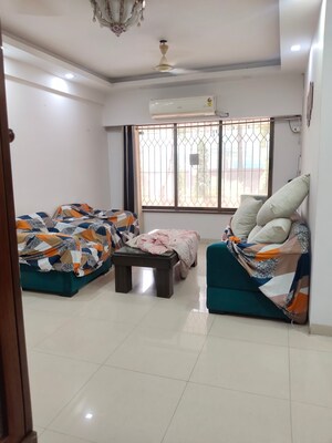 Living Room in 2 BHK Apartment at Palash Towers, Andheri West – for Rent