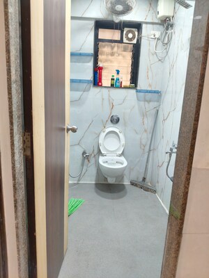 Bathroom in 2 BHK Apartment at Palash Towers, Andheri West – for Rent